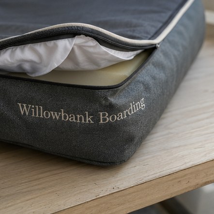 Personalized dog beds with a logo